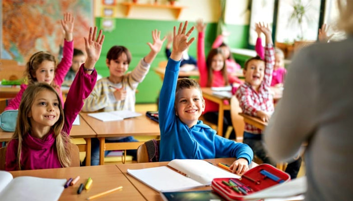 Children Actively Participating in Classroom Discussion