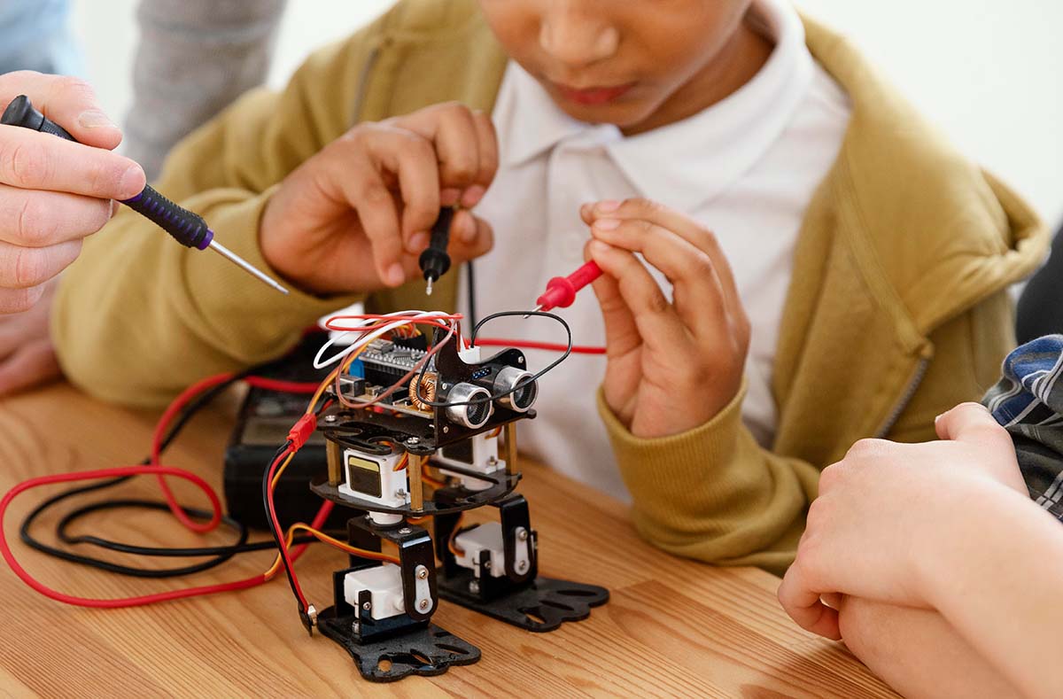 Student Building an IoT and Electronics Project
